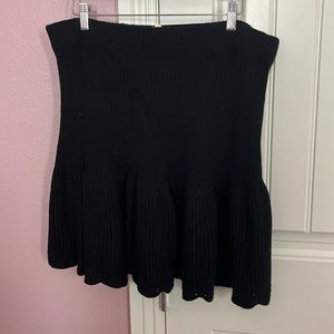 Anthropology black sweater skirt with tulip style detail.